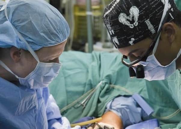 Surgery. (U.S. Army photo by Maria Pinel)