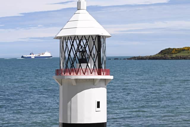 A ten-foot-tall lighthouse built by prisoners in Maghaberry will help shine a spotlight on the convalescent work of the cancer charity Hope House Ireland. The wooden structure, which took several months to construct in Maghaberry Prison, was this week relocated to Hope House Cottage on the beach at Browns Bay, Islandmagee. Picture: Michael Cooper