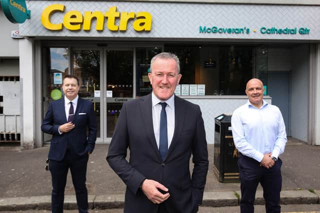 Finance Minister, Conor Murphywith Glyn Roberts Chief Executive of Retail NI and Donagh McGoveran owner of Centra Cathedral Quarter which will benefit from a £5,000 top up grant