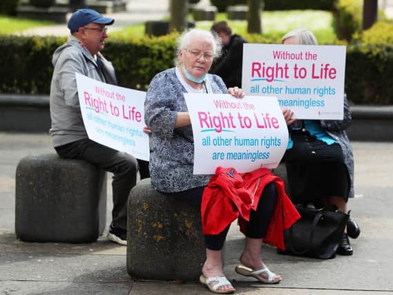 Anti abortion demonstrators outside Belfast High Court as a legal challenge against Northern Ireland Secretary of State Brandon Lewis, the Northern Ireland Executive and the Department of Health over the failure to commission and fund abortion services in Northern Ireland continues.