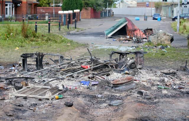 The scene at Distillery Street in west Belfast last August after PSNI officers moved in with contractors to remove internment bonfire material.  26 officers were injured after they were attacked by rioters. 

Picture by Jonathan Porter/PressEye
