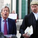 Arlene Foster's solicitor Paul Tweed (left) outside Belfast High Court following the defamation judgment on Thursday. Photo: Brian Lawless/PA Wire