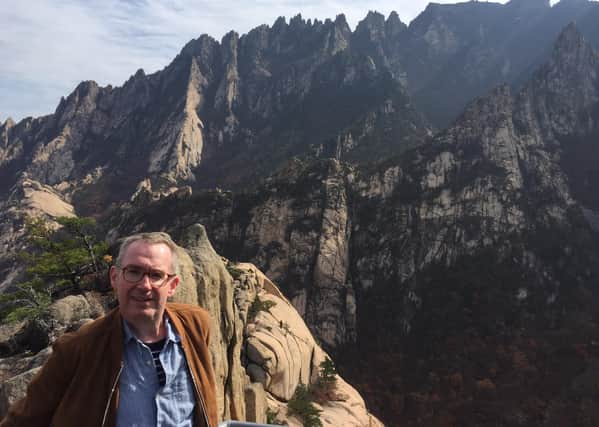 Colin Crooks, from Dungannon, in some of North Korea’s rugged landscape during his time there