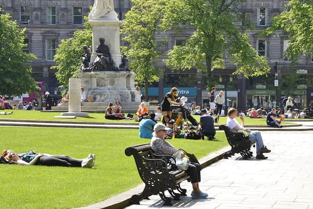 Sunseekers enjoy Sunday’s good weather at Belfast City Hall