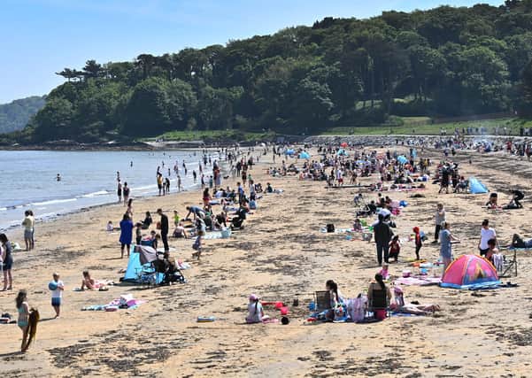 Crowds gather at Helen's Bay beach on May bank holiday Monday.
Pic: Colm Lenaghan/Pacemaker