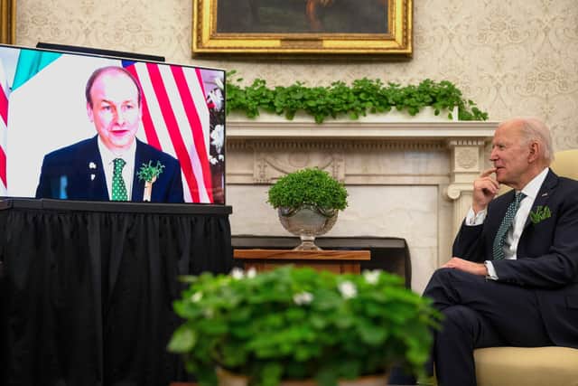 The Taoiseach Micheal Martin talks to Joe Biden on St Patrick’s Day this year. However much the US president values his Irish roots, his corporate tax plan has gone down badly in the Republic of Ireland, where the rate is just 12.5%