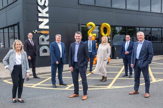 Celebrating 20 years in business are the sales team at Drinks Inc with Musgrave wholesale director, Richard Mayne