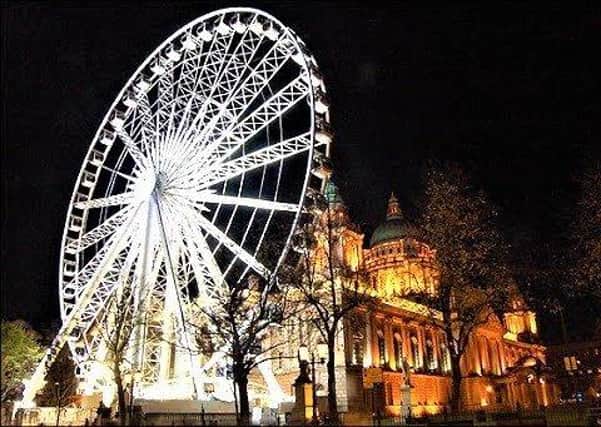 The big wheel at Belfast City Hall; a smaller model is now to open in Botanic Gardens in a few weeks’ time
