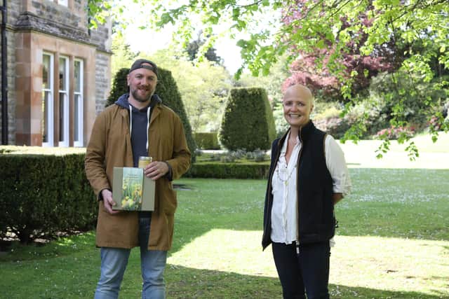 Pictured in the heritage courtyards of Elmfield Estate with Jane Shaw, Elmfield Estate, is Michael Morris of The Bearded Candle Makers who will be trading at Elmfield Market
