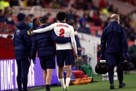 England's Trent Alexander-Arnold leaves the pitch after picking up an injury during the International Friendly match at The Riverside Stadium, Middlesbrough.