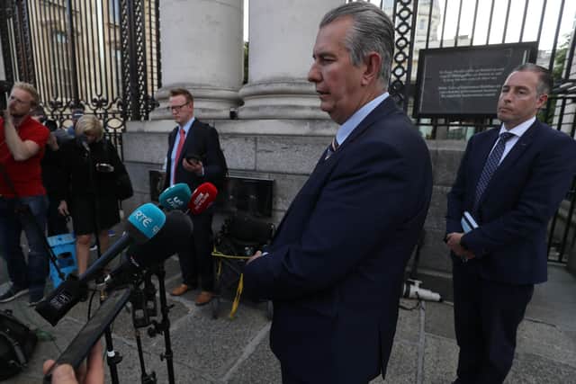 DUP leader Edwin Poots, with MLA Paul Givan (right), speaks to media after a meeting with Taoiseach Micheal Martin. Photo: Brian Lawless/PA Wire