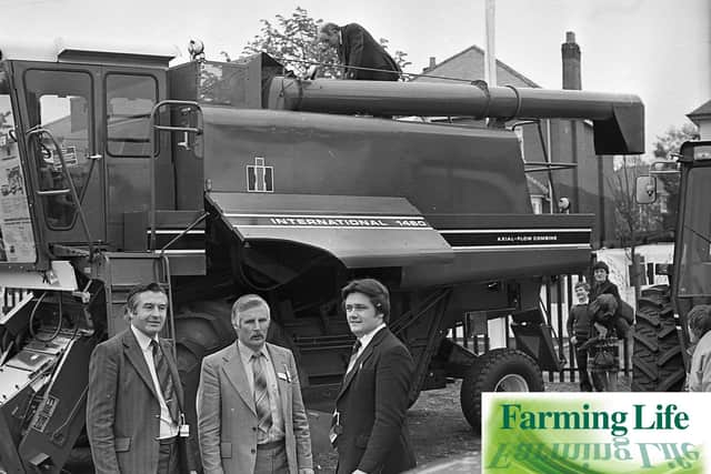 Mr Martin Tyse, right, area manager for International Harvester Co with F H Sanderson, centre, sale manager for Saville Tractors (Belfast) Ltd, the I H distributors in Northern Ireland at the Balmoral Show in May 1981. On the left is Jim Browne, Saville's dealer representative. Picture: Farming Life archives