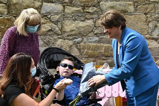 First Minister, Arlene Foster, (right) pictured during a visit to the Buddy Bear Trust Conductive Education School, Dungannon.