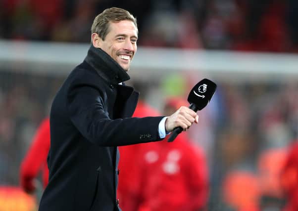 Former player Peter Crouch before the Premier League match at Anfield, Liverpool.