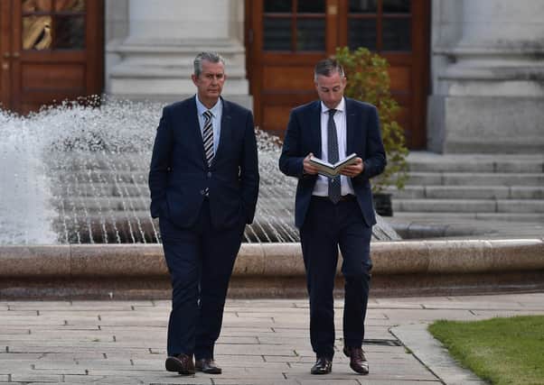 Edwin Poots in Dublin on Friday with Paul Givan, the man who is expected to be appointed first minister within days. Photo: Charles McQuillan/Getty
