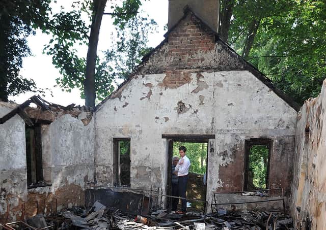 An Orange hall near Loughgall is burnt out in 2015. Since 1969 there have been over 600 attacks on Orange facilities