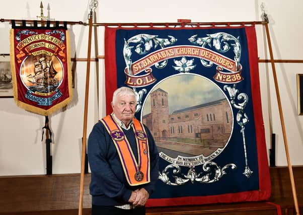 District Master of Bangor District LOL 18 Martyn McCready with an old Orange Lodge banner  that has been recently recovered from an attic in Dublin.  Pic Colm Lenaghan/Pacemaker