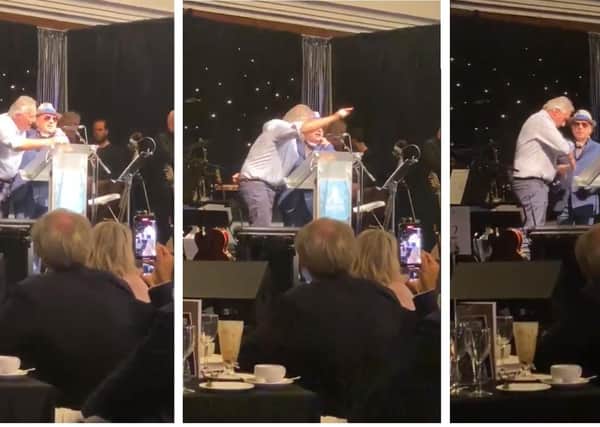 Images taken from a video of Ian Paisley Jr on stage with Van Morrison chanting against the health minister