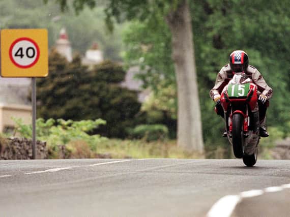 Can you name this Isle of Man TT rider, the year and section of the course?
