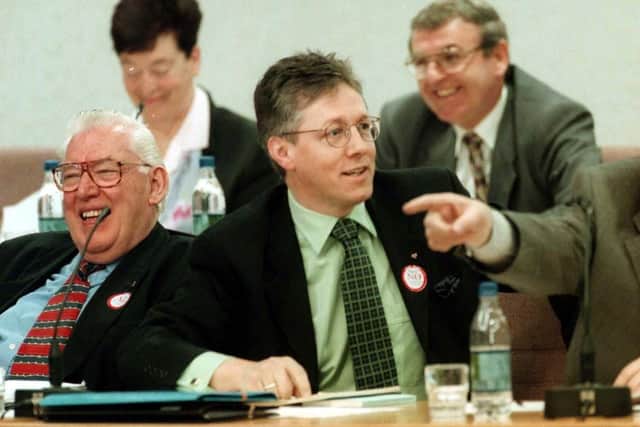The then DUP leader Dr Ian Paisley and his deputy Peter Robinson in the late 1990s.  Peter Robinson oversaw and ran every aspect of the party. A weak leader needs a Robbo at his side but Edwin Poots does not have one