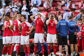 The anguish shows on Danish players’ faces as Christian Eriksen is treated on the pitch on Saturday. Robin Swann says of defibrillators: "We’ve seen very clearly over the weekend how vital those pieces of equipment are"