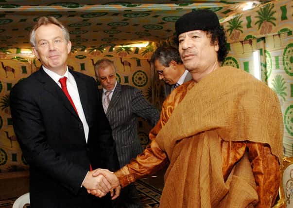 Former Prime Minister Tony Blair meeting Libyan leader Colonel Muammar Gaddafi at his desert base outside Sirte, south of Tripoli in 2007. Photo: Stefan Rousseau/PA Wire