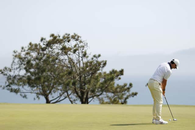 Rory McIlroy of Northern Ireland putts on the fourth green during the first round of the 2021 U.S. Open at Torrey Pines Golf Course (South Course) on June 17, 2021 in San Diego, California. (Photo by Ezra Shaw/Getty Images)