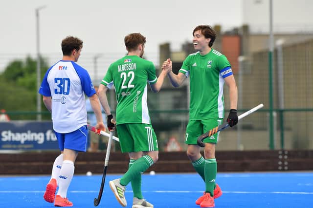 Ireland's Sean Murray and Michael Robson celebrate victory over Scotland at Jordanstown.