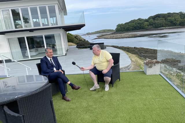 Edwin Poots being interviewed by Stephen Nolan at the BBC presenter’s home on the shore of Strangford Lough