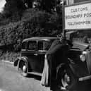 Customs officers checking Jim Johnston’s car, Tullyhommon, August 3, 1946