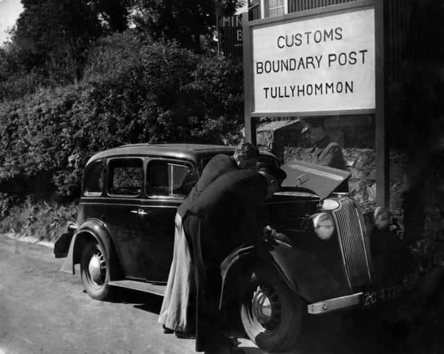 Customs officers checking Jim Johnston’s car, Tullyhommon, August 3, 1946