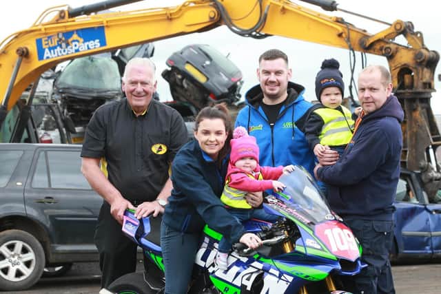 Armoy Clerk of the Course, Bill Kennedy MBE and road racer Neil Kernohan pictured with Martin and Nicole Laverty, Euro Autospares Limited - sponsors of the Open Superbike race - and their children, Clodagh and Caidan.
