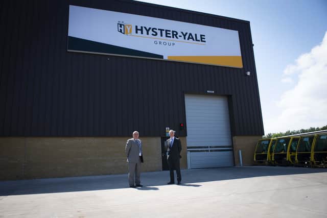 Jim Downey, Plant Manager for Hyster-Yale Group EMEA and Kevin Holland, Invest NI’s CEO outside Hyster-Yale in Craigavon