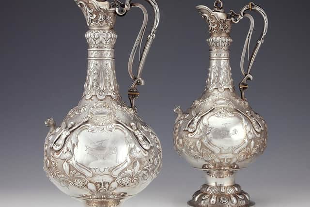 The pair of Victorian Irish silver Armada pattern claret jugs owned by Sir Edwards Carson have come up for auction.