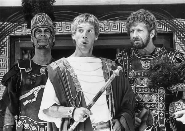 1979: Members of the British comedy team, Monty Python, during the filming of their controversial film 'The Life of Brian', (from left) John Cleese, Michael Palin and Graham Chapman. (Photo by Evening Standard/Getty Images)