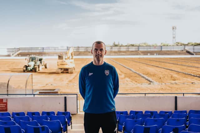 Oran Kearney pictured in front of the new pitch installation works at The Showgrounds. PICTURE: David Cavan