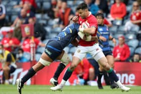 Conor Murray of the Lions is tackled by Amanaki Lelei Mafi of Japan during the 1888 Cup match between the British & Irish Lions and Japan at BT Murrayfield Stadium on June 26, 2021 in Edinburgh, Scotland. (Photo by Ian MacNicol/Getty Images)
