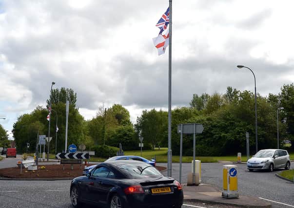 Flags have been erected on lamposts at the Craigavon Area Hospital roundabout.