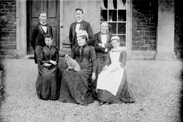 Joseph Grainge, who was drowned in the sinking of the Mountstewart on Strangford Lough, pictured with other staff outside Mount Stewart.