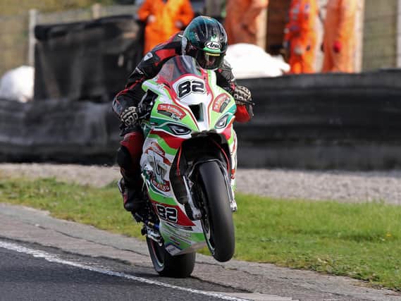 Derek Sheils took a race win on the Roadhouse Macau BMW at the opening round of the Dunlop Masters Superbike Championship at Mondello Park on Sunday.