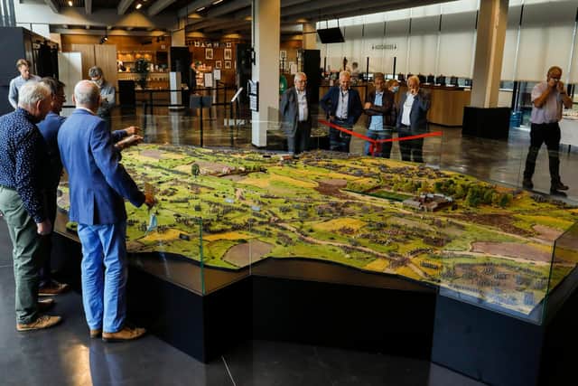 Visitors look at the biggest scale model of the battle field of Waterloo at the Memorial Bataille de Waterloo 1815 in Braine-L'Alleud, on July 7, 2020. (Photo by THIERRY ROGE / Belga / AFP) / Belgium OUT (Photo by THIERRY ROGE/Belga/AFP via Getty Images)