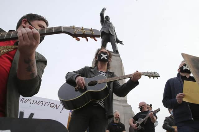 Alive Music Matters protest at the Carson Statue at Stormont this morning. (Photo: Pacemaker)
