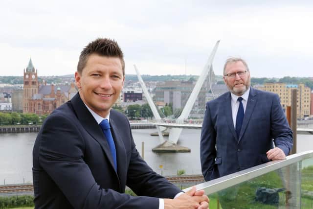 Ryan McCready (left) and UUP leader, Doug Beattie at the Peace Bridge in Londonderry.