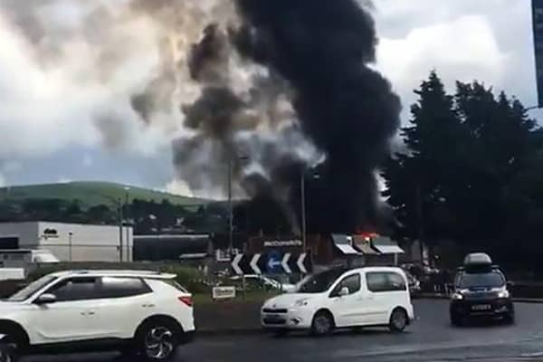 Picture taken with permission from the twitter feed of @BernieMullen of the large fire that has broken out at O'Doherty and Sons Coffin and Casket manufacturers in Railway Street, Strabane, amid reports it was struck by lightning.