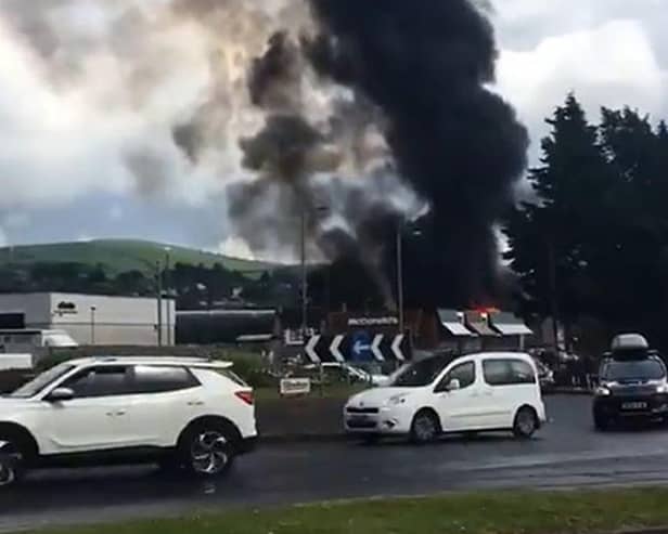 Picture taken with permission from the twitter feed of @BernieMullen of the large fire that has broken out at O'Doherty and Sons Coffin and Casket manufacturers in Railway Street, Strabane, amid reports it was struck by lightning.