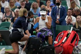 Emma Raducanu appears to be struggling during a break in the match against Ajla Tomljanovic in their Women's Singles Round of 16 match on day seven of Wimbledon.