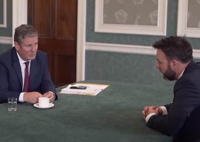 Sir Keir Starmer meeting Colum Eastwood, leader of Labour's sister party, the SDLP, during his visit to NI last month