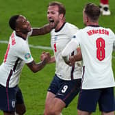 England’s Raheem Sterling, Harry Kane and Jordan Henderson celebrate after beating Denmark in their Euro 2020 semi-final at Wembley.