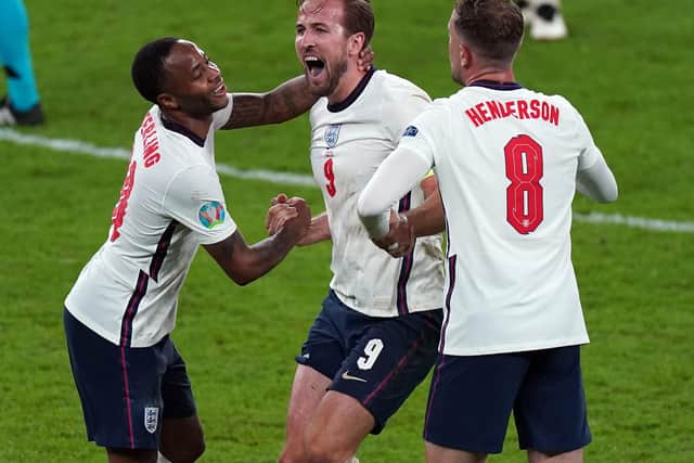 England’s Raheem Sterling, Harry Kane and Jordan Henderson celebrate after beating Denmark in their Euro 2020 semi-final at Wembley.