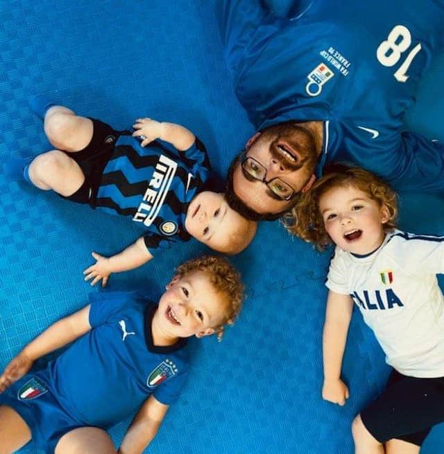 Italian fan Dino Cafolla with his children Arianna (5), Emilia (8 months) and Vito (3)